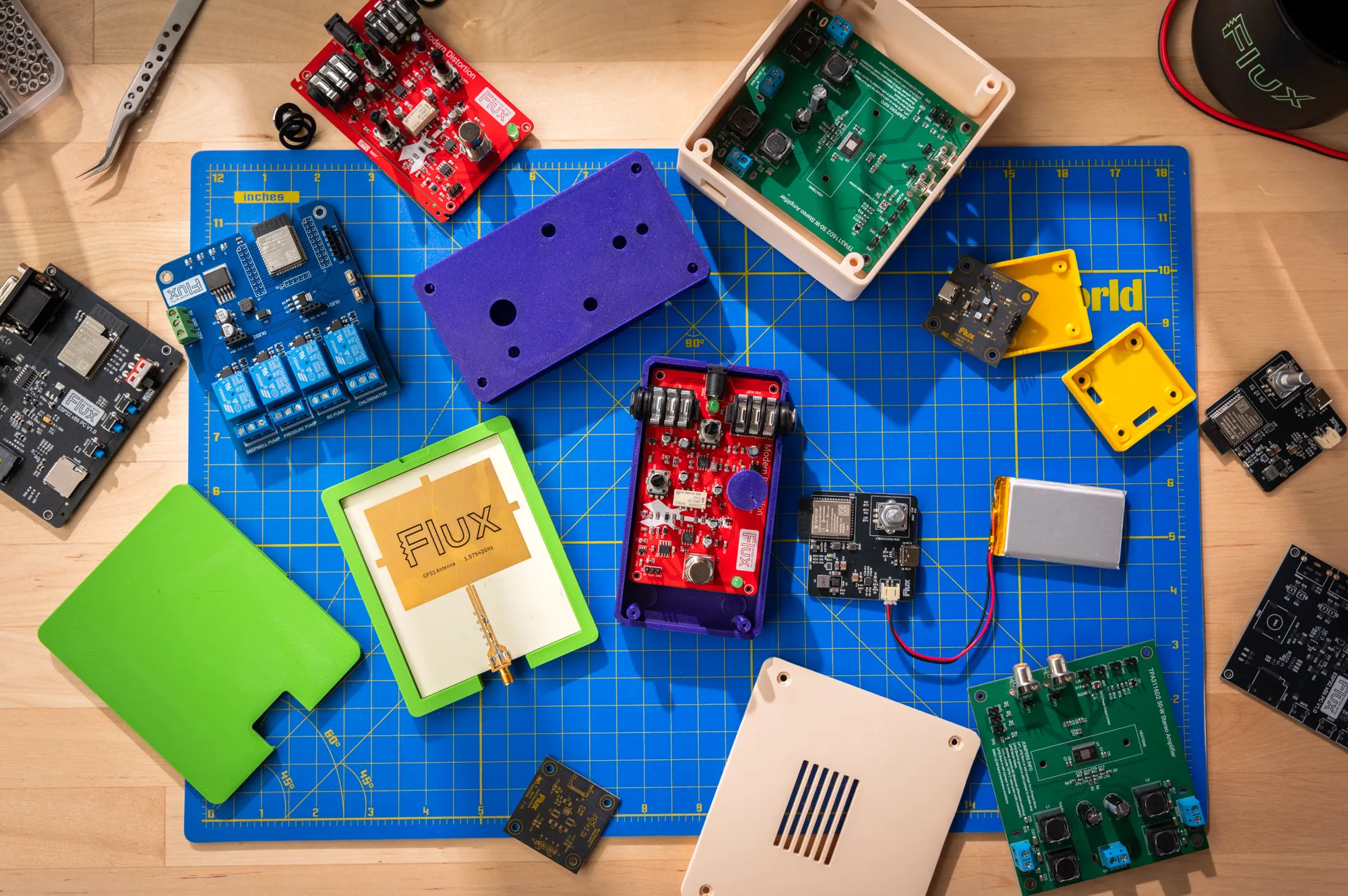 A 3D-printed custom hardware enclosure generated by Flux around a printed circuit board