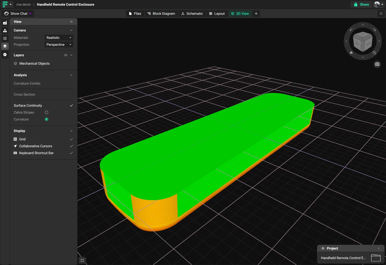Curvature map of the same shell: the flat top and side faces are green, and the rounded end and the blend along the bottom edge are orange
